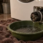 Nettoyer le filtre du lave linge : fuite évitée, filtre ouvert